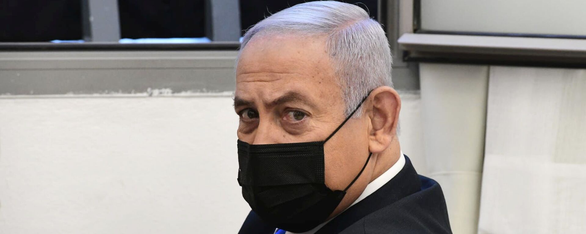 Israeli Prime Minister Benjamin Netanyahu looks on before the start of a hearing in his corruption trial at Jerusalem's District Court February 8, 2021. - Sputnik International, 1920, 08.02.2021