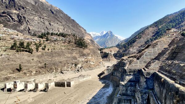 A view shows a damaged barrage after a part of a glacier broke away causing glacial flood in Chormi village in Tapovan, in the northern state of Uttarakhand, India, February 7, 2021.  - Sputnik International