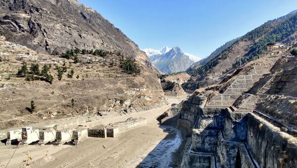 A view shows a damaged barrage after a part of a glacier broke away causing glacial flood in Chormi village in Tapovan, in the northern state of Uttarakhand, India, February 7, 2021. Picture taken February 7, 2021. REUTERS/Stringer NO ARCHIVES. NO RESALES. - Sputnik International