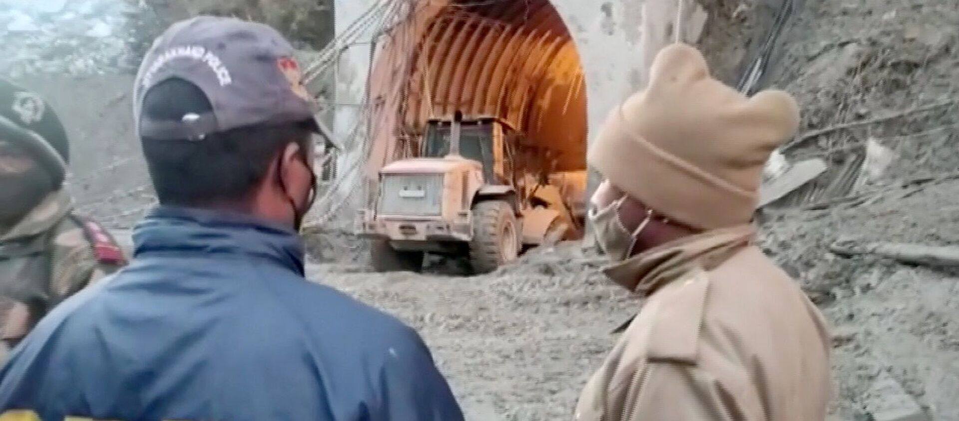 Excavator exits a tunnel in Chamoli, Uttarakhand, India during a rescue operation after a glacier burst, in this still frame taken from video dated February 8, 202 - Sputnik International, 1920, 09.02.2021