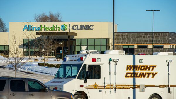 A Wright County Sheriff vehicle is seen parked outside the Allina Health Clinic in Buffalo, Minnesota, after a shooting there left at least five wounded on February 9, 2021.  - Sputnik International