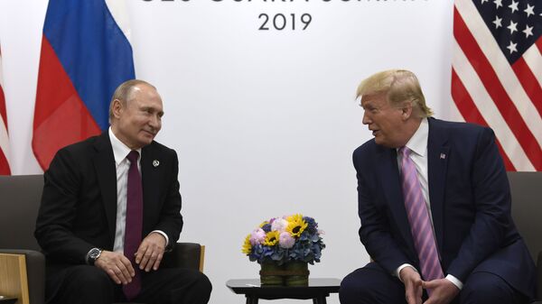  In this June 28, 2019, file photo, President Donald Trump, right, meets with Russian President Vladimir Putin during a bilateral meeting on the sidelines of the G-20 summit in Osaka, Japan. - Sputnik International