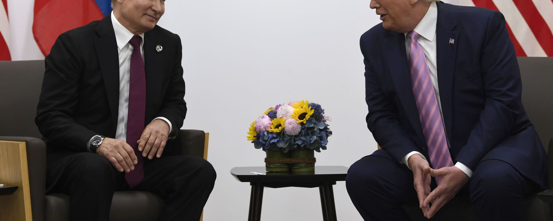  In this June 28, 2019, file photo, President Donald Trump, right, meets with Russian President Vladimir Putin during a bilateral meeting on the sidelines of the G-20 summit in Osaka, Japan. - Sputnik International, 1920, 05.04.2024