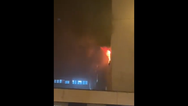 A screenshot from a video showing a hospital in the Spanish city of Cadiz on fire. - Sputnik International