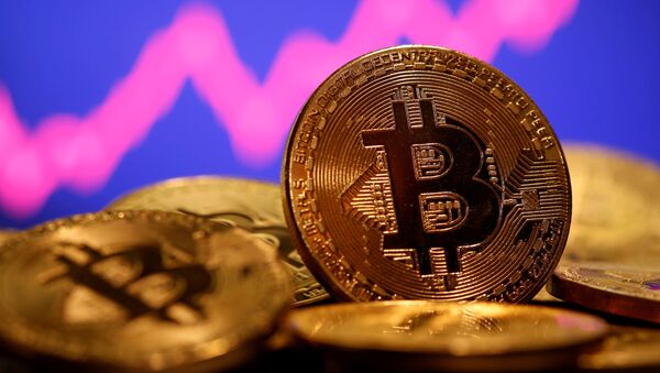 A representation of virtual currency Bitcoin is seen in front of a stock graph in this illustration taken 8 January 2021. REUTERS/Dado Ruvic/File Photo - Sputnik International