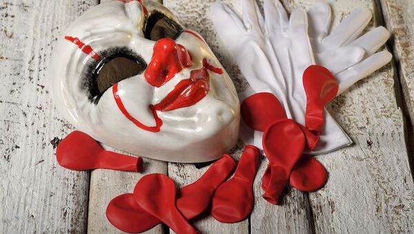An image showing a mask, gloves and red balloons - Sputnik International