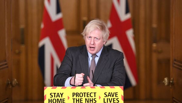 Britain's Prime Minister Boris Johnson addressees the media at a coronavirus disease (COVID-19) pandemic briefing in Downing Street, London, Britain February 3, 2021.  - Sputnik International