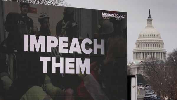 A video screen affixed to a truck flashes an anti-Trump message near the U.S. Capitol during former U.S President Donald Trump's second impeachment trial in Washington, U.S., February 12, 2021 - Sputnik International
