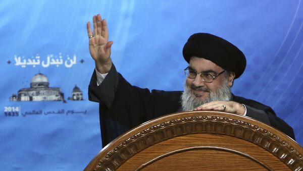  In this July 25, 2014, file photo, Hezbollah leader Sheik Hassan Nasrallah speaks during a rally to mark Jerusalem Day or Al-Quds day, in the southern suburb of Beirut, Lebanon. On Sunday, Nov. 5, 2017 Nasrallah, in a televised speech, said the country's prime minister Saad Hariri was forced by Saudi Arabia to resign - Sputnik International