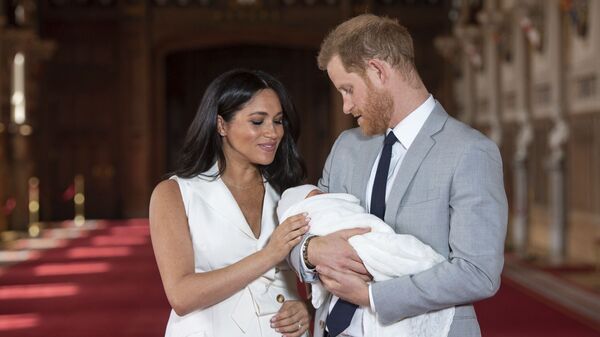 In this Wednesday May 8, 2019 file photo Britain's Prince Harry and Meghan, Duchess of Sussex, pose during a photocall with their newborn son Archie, in St George's Hall at Windsor Castle, Windsor, south England. The Duchess of Sussex has revealed that she had a miscarriage in July. Meghan described the experience in an opinion piece in the New York Times on Wednesday. She wrote: I knew, as I clutched my firstborn child, that I was losing my second. The former Meghan Markle and husband Prince Harry have a son, Archie, born in 2019.  - Sputnik International