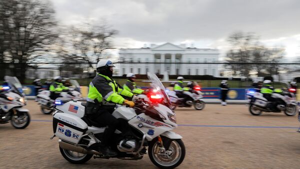 Police officers on motorcycles drive in front of the White House during the rehearsals for the inauguration of U.S. President-elect Joe Biden in Washington, U.S. January 18, 2021 - Sputnik International