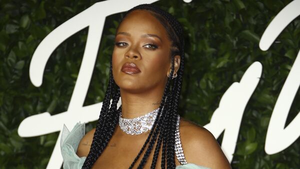 Singer Rihanna poses for photographers upon arrival at the British Fashion Awards in central London, Monday, Dec. 2, 2019.  - Sputnik International