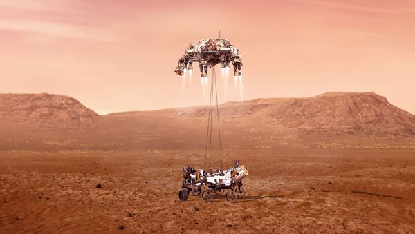 This illustration provided by NASA shows the Perseverance rover, bottom, landing on Mars. - Sputnik International