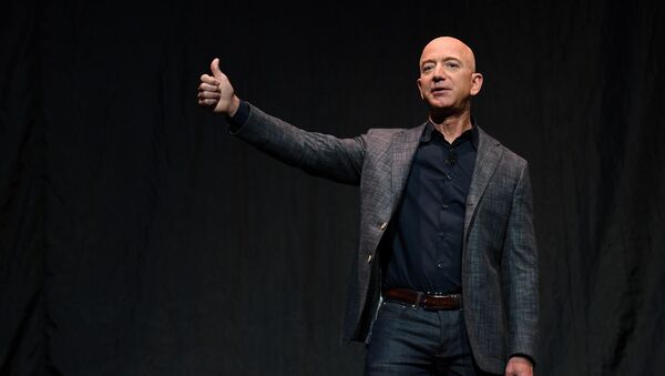 Founder, Chairman, CEO and President of Amazon Jeff Bezos gives a thumbs up as he speaks during an event about Blue Origin's space exploration plans in Washington, U.S., May 9, 2019. - Sputnik International