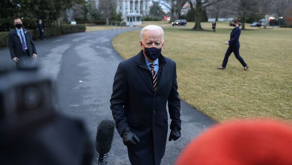 U.S. President Joe Biden speaks to members of the media as he departs for travel to Milwaukee, Wisconsin, from the South Lawn of the White House in Washington, U.S., February 16, 2021. - Sputnik International