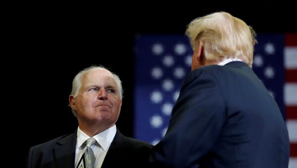 Talk show host Rush Limbaugh introduces U.S. President Donald Trump on the eve of the U.S. mid-term elections at a campaign rally at the Show Me Center in Cape Girardeau, Missouri, U.S., November 5, 2018 - Sputnik International