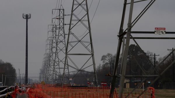 Overhead power lines are seen during record-breaking temperatures in Houston, Texas, U.S., February 17, 2021.  - Sputnik International