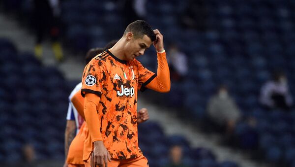 Juventus' Portuguese forward Cristiano Ronaldo gestures during the UEFA Champions League round of 16 first leg football match between Porto and Juventus at the Dragao stadium in Porto on February 17, 2021 - Sputnik International