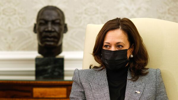 US Vice President Kamala Harris and U.S. President Joe Biden (not pictured) attend a meeting with bipartisan Senators on infrastructure investment at the Oval Office of the White House in Washington, U.S., February 11, 2021 - Sputnik International