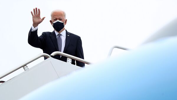 U.S. President Joe Biden boards Air Force One as he departs Washington for travel to visit a Pfizer manufacturing plant in Michigan, at Joint Base Andrews, Maryland, U.S., February 19, 2021. - Sputnik International
