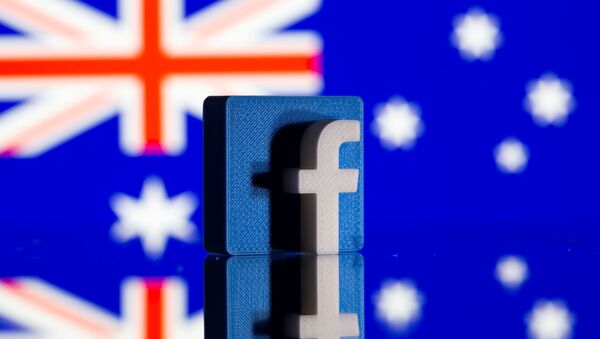 A 3D printed Facebook logo is seen in front of displayed Australia's flag in this illustration photo taken February 18, 2021 - Sputnik International