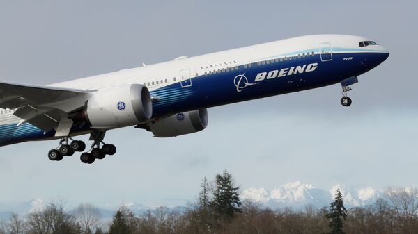 A Boeing 777X airplane takes off during its first test flight from the company's plant in Everett, Washington, U.S. January 25, 2020.  - Sputnik International
