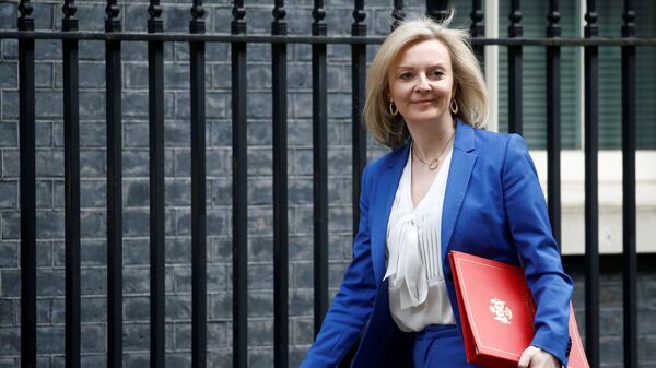 Britain's Secretary of State of International Trade and Minister for Women and Equalities Liz Truss is seen outside Downing Street, in London, Britain March 17, 2020. - Sputnik International