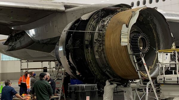 The damaged starboard engine of United Airlines flight 328, a Boeing 777-200, is seen following a February 20 engine failure incident - Sputnik International