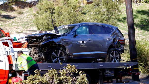 The damaged car of Tiger Woods is towed away after he was involved in a car crash, near Los Angeles, California, 23 February 2021.  - Sputnik International