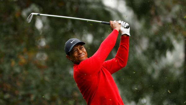 FILE PHOTO: Golf - The Masters - Augusta National Golf Club - Augusta, Georgia, U.S. - November 15, 2020 Tiger Woods of the U.S. on the 4th hole during the final round REUTERS/Mike Segar/File Photo - Sputnik International