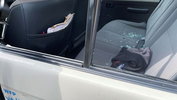 A view shows shuttered car windows at the scene where the Italian ambassador to Democratic Republic of Congo Luca Attanasio,  Italian military policeman Vittorio Iacovacci and Congolese driver Moustapha Milambo from the World Food Programme were killed in an attempted kidnap when their convoy was attacked in Ruhimba village, eastern Democratic Republic of the Congo February 22, 2021 - Sputnik International