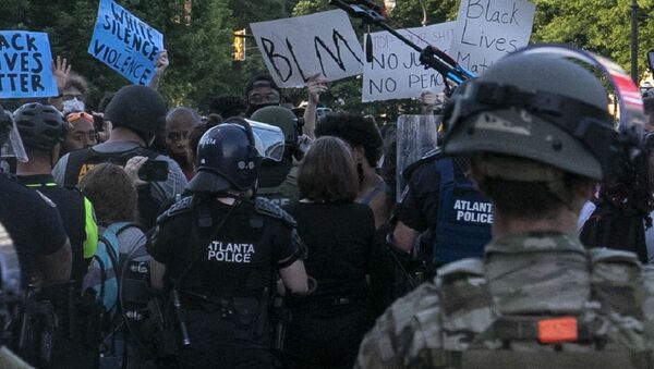 Georgia National Guard Soldiers and Airmen support Atlanta Police Department officers enforcing curfew in Atlanta June 1, 2020 - Sputnik International