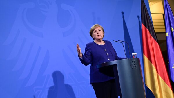 German Chancellor Angela Merkel addresses a press conference following the EU leaders' videoconference in Berlin, Germany February 25, 2021. - Sputnik International