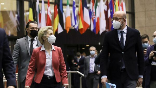 European Commission President Ursula von der Leyen and European Council President Charles Michel prepare for a press conference at the end of a video conference of European Council members on COVID-19 pandemic, in Brussels, Belgium February 25, 2021 - Sputnik International