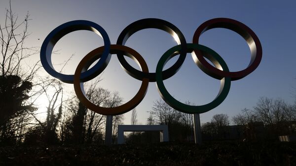 The Olympic rings are pictured in front of the International Olympic Committee (IOC) headquarters during the coronavirus disease (COVID-19) outbreak in Lausanne, Switzerland, February 24, 2021 - Sputnik International