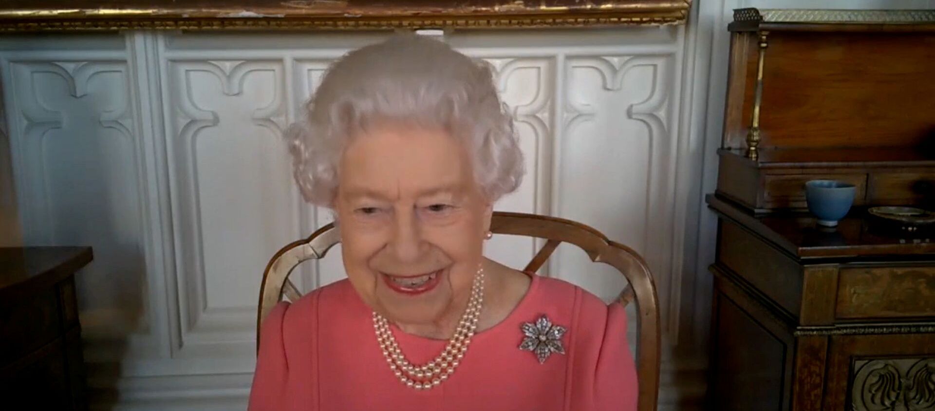 Britain's Queen Elizabeth speaks via video call to health leaders delivering the COVID-19 vaccine across England, Scotland, Wales and Northern Ireland, London, Britain February 25, 2021 - Sputnik International, 1920, 26.02.2021