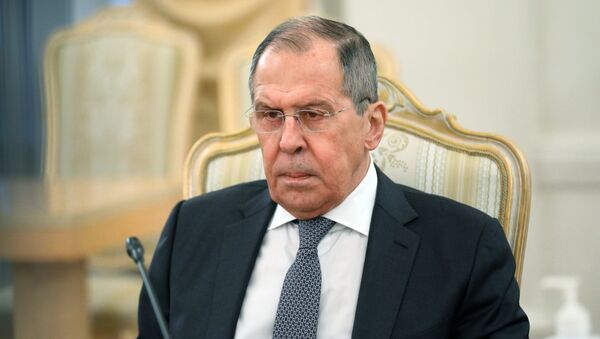 Russian Foreign Minister Sergei Lavrov during a meeting with his Afghan counterpart Mohammad Hanif Atmar on Friday, February 26, 2021. - Sputnik International