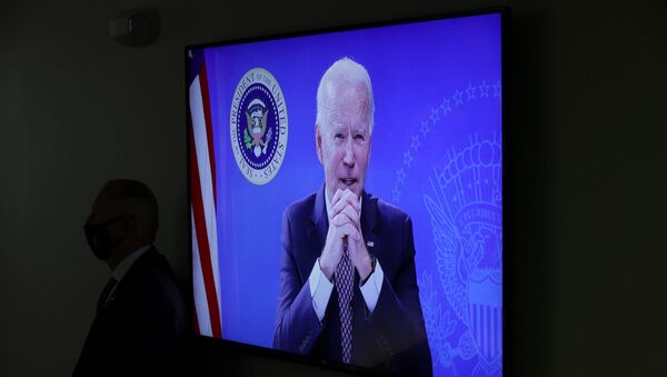 U.S. President Joe Biden is seen on a video display as he delivers remarks virtually to the National Governors Association Winter Meeting from the South Court Auditorium at the White House in Washington, U.S., February 25, 2021 - Sputnik International