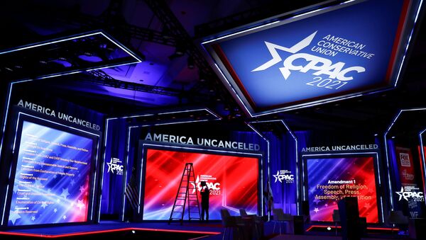 Technicians work on the stage before the start of the Conservative Political Action Conference (CPAC) in Orlando, Florida, U.S. February 25, 2021. - Sputnik International
