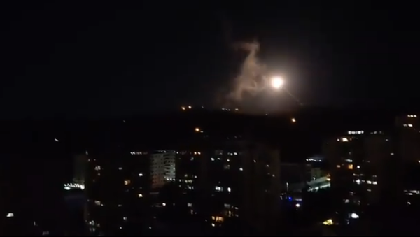 Screenshot from the video allegedly showing a rocket attack in the sky above the Syrian capital city of Damascus - Sputnik International