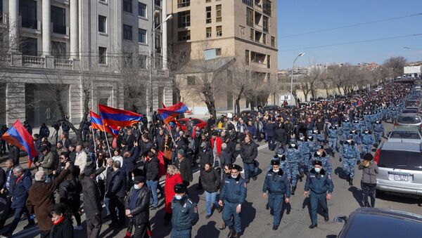 People attend an opposition demonstration to demand the resignation of Armenian Prime Minister Nikol Pashinyan in Yerevan, Armenia February 26, 2021 - Sputnik International