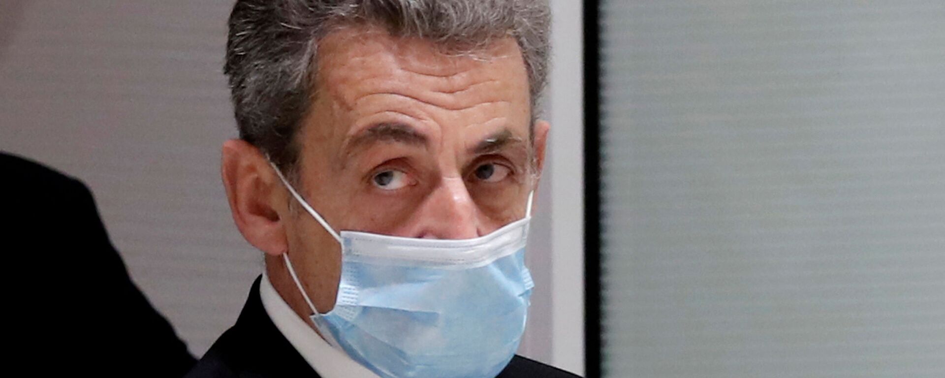 Former French President Nicolas Sarkozy leaves the courtroom during his trial on charges of corruption and influence peddling, at Paris courthouse, France, December 7, 2020. REUTERS/Benoit Tessier/File Photo - Sputnik International, 1920, 01.03.2021