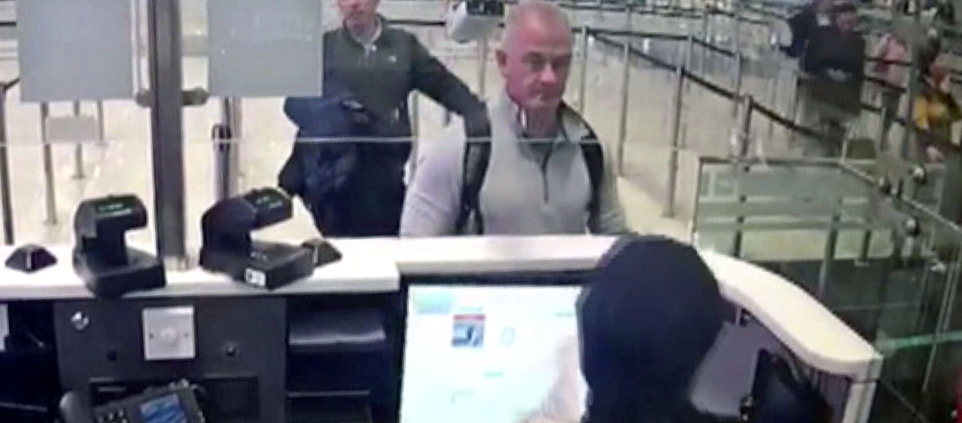 This Dec. 30, 2019 image from security camera video shows Michael L. Taylor, center, and George-Antoine Zayek at passport control at Istanbul Airport in Turkey. The U.S. State Department has agreed to turn over to Japan Taylor and his son Peter Taylor, who are accused of smuggling former Nissan Motor Co. Chairman Carlos Ghosn out of the country while he was awaiting trial, the men's lawyers said in legal filing on Thursday, Oct. 29, 2020 - Sputnik International, 1920, 14.06.2021