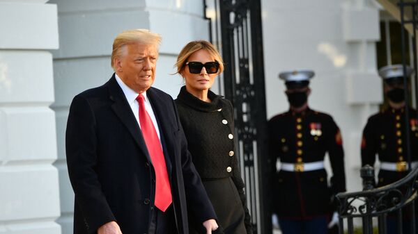 US President Donald Trump and First Lady Melania make their way to board Marine One before departing from the South Lawn of the White House in Washington, DC on January 20, 2021. - Sputnik International