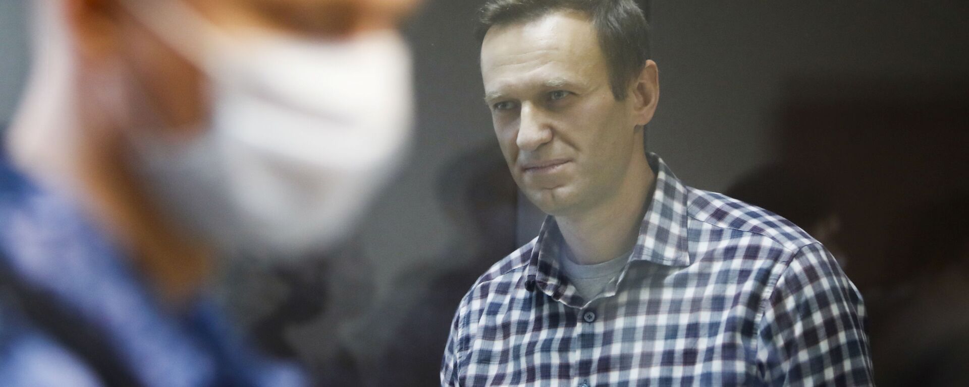 Russian opposition politician Alexei Navalny attends a hearing to consider an appeal against an earlier court decision to change his suspended sentence to a real prison term, in Moscow, Russia February 20, 2021. - Sputnik International, 1920, 19.10.2021