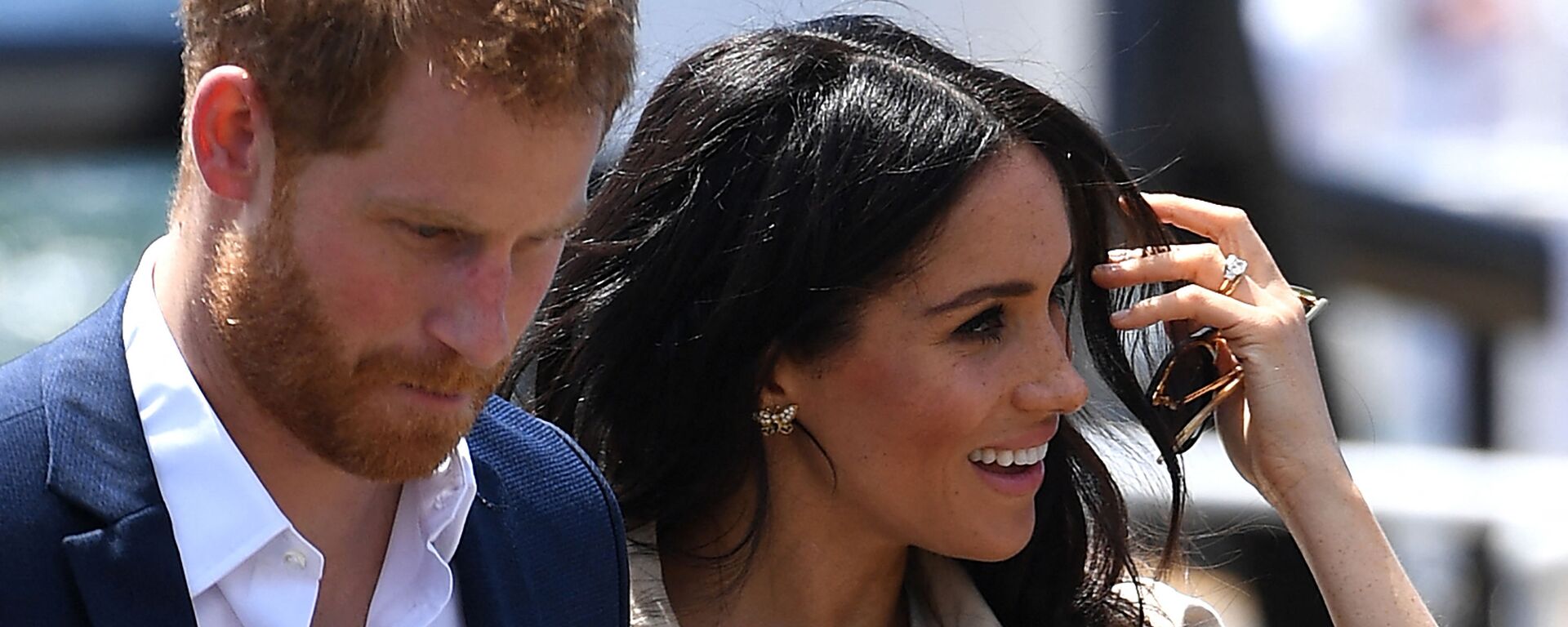 (FILES) In this file photo Britain's Prince Harry and wife Meghan arrive for a public walk at the Sydney Opera House in Sydney on October 16, 2018 - Sputnik International, 1920, 03.03.2021