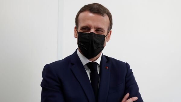 French President Emmanuel Macron, wearing a protective face mask, visits a coronavirus disease (COVID-19) vaccination center at the Caisse Primaire d'Assurance Maladie (France's local health insurance funds - CPAM) in Bobigny near Paris as part of the COVID-19 vaccination campaign in France, March 1, 2021. - Sputnik International