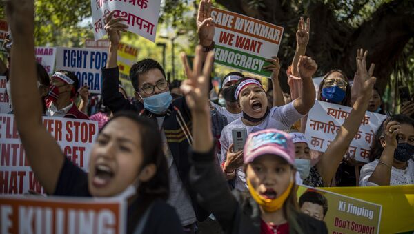 Chin refugees from Myanmar shout slogans during a protest against military coup in Myanmar, in New Delhi, India, Wednesday, March 3, 2021 - Sputnik International