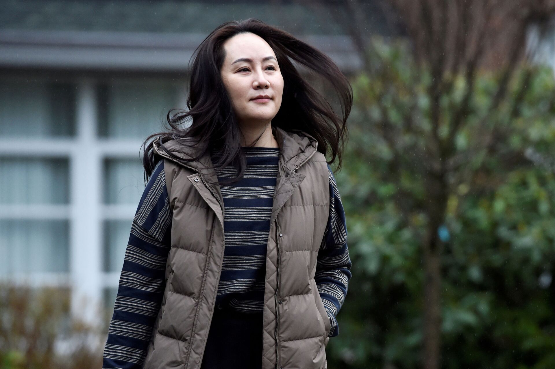 Huawei Technologies Chief Financial Officer Meng Wanzhou leaves her home to attend a court hearing in Vancouver, British Columbia, Canada December 7, 2020. - Sputnik International, 1920, 25.09.2021