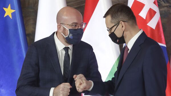 European Council President Charles Michel, left, and Poland's Prime Minister Mateusz Morawiecki during welcoming ceremony ahead of a ceremonious meeting that marks 30 years of central Europe's informal body of cooperation between Poland, Hungary, Slovakia and The Czech Republic, called the Visegrad Group, at the Wawel Castle in Krakow, Poland, Wednesday, Feb. 17, 2021 - Sputnik International